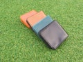 Group Wallets on grass Royalty Free Stock Photo