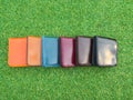 Group Wallets on grass Royalty Free Stock Photo