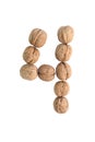 The group of walnuts on white background, making number 3. Studio shot Royalty Free Stock Photo