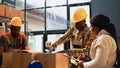 Group of warehouse employees preparing containers