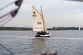 Group of water scouts in a sailboat on a lake in the Netherlands