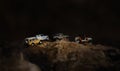 Group of 4wd off road cars crossing through the country road. Royalty Free Stock Photo