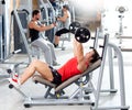 Group with weight training equipment on sport gym Royalty Free Stock Photo