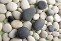 Group of white and grey pebbles in two layers, simple stones background Royalty Free Stock Photo