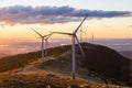 A group of wind mills on a mountain ridge in Austria