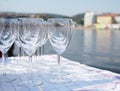 Group of wine glasses and a river Royalty Free Stock Photo