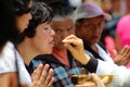 Group of women awaits the communion