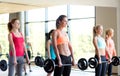 Group of women with barbells in gym Royalty Free Stock Photo