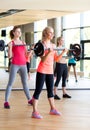 Group of women with barbells in gym Royalty Free Stock Photo