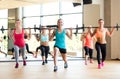 Group of women with barbells in gym Royalty Free Stock Photo