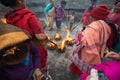 Group of women burning sticks in Temple. Kathmandu