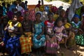 Group of women and children at a community meeting in the village of Mandina Mandinga in the Gabu Region Royalty Free Stock Photo