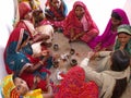 Group of women drinks tea in one of the courtyards of the Amber fort in Jaipur, India
