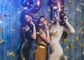 Group of women with fireworks at party having fun. Royalty Free Stock Photo