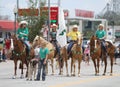 Group of women on horseback for 4H in a parade in small town America Royalty Free Stock Photo