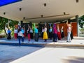 A group of women learn traditional Spanish dancing on the stage of the small open-air theatre in Malaga, Spain.