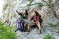 Group women lifestyle of hikers helping and checking map with backpack on a forest mountain. Traveler going camping.