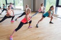 Group of women making lunge exercise in gym Royalty Free Stock Photo