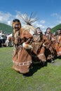 Group of women in national clothing aborigine of Kamchatka expression dancing near yaranga