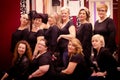 Group of women posing in hairdressing salon