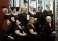 Group of women posing in hairdressing salon