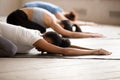 Group of women practicing yoga in Child pose Royalty Free Stock Photo