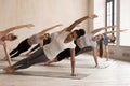 Group of women practicing yoga lesson, Side Plank pose Royalty Free Stock Photo