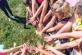 Group of women putting their beauty hands together stylish colorful nails art manicure