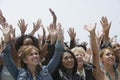 Group Of Women Raising Hands