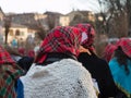 Group of Women with Red Scottish Kerchief and Shawles in Public