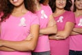 Group of women with silk ribbons, closeup.