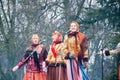The group of women in traditional Russian clothers sing a song on Maslenitsa in Moscow.