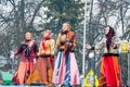 The group of women wearing traditional Russian clothers sing a song on Maslenitsa in Moscow. Royalty Free Stock Photo