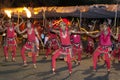 A group of Wood Tappers perform infront of a large crowd during the Esala Perahera, Kandy, Sri Lanka. Royalty Free Stock Photo