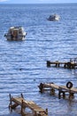 Group of wooden docks and and Boats on the Lake Titicaca, the World`s Highest Navigable Lake, Copacabana Town, Bolivia Royalty Free Stock Photo