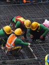 Group of worker with seafty set work on streel wire structure in construction area