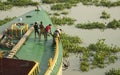Turag River, Dhaka, Bangladesh - September 28, 2025: Workers Dropping Anchor from Ship on River Royalty Free Stock Photo