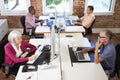 Group Of Workers At Desks In Modern Design Office Royalty Free Stock Photo