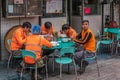Group of workers enjoying lunch, Hong Kong China