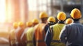 Group of workers in hardhats and reflective safety vests are seen from the back, standing together. AI generated Royalty Free Stock Photo
