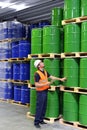 group of workers in the logistics industry work in a warehouse with chemicals Royalty Free Stock Photo