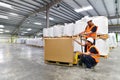 group of workers in the logistics industry work in a warehouse with chemicals Royalty Free Stock Photo