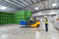 group of workers in the logistics industry work in a warehouse with chemicals Royalty Free Stock Photo