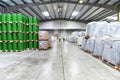 Group of workers in the logistics industry work in a warehouse w