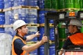 Group of workers in the logistics industry work in a warehouse w Royalty Free Stock Photo