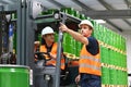 Group of workers in the logistics industry work in a warehouse w Royalty Free Stock Photo