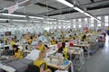 Textile Industry factory, crowd of hardworking workers, production line