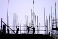 Silhouette of construction site with workers Royalty Free Stock Photo