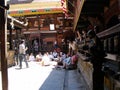 Group of worshipers inside Hiranya Varna Mahavihar. Golden Temple. Patan, Kathmandu. Nepal