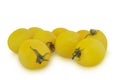 Group of yellow tomatoes isolated on white background